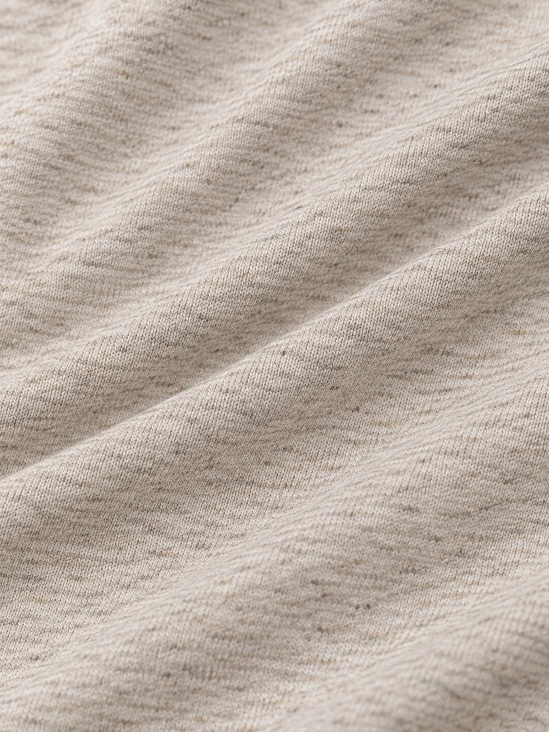 Melierter Golf-Pullover in Haferbeige mit kurzem Reißverschluss
