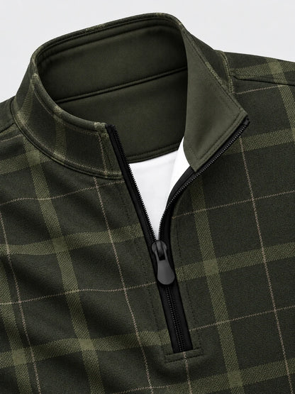 Golf-Pullover aus Funktionsmaterial in dunklem Olivgrün mit klassischem Heritage-Karomuster und Viertelreißverschluss