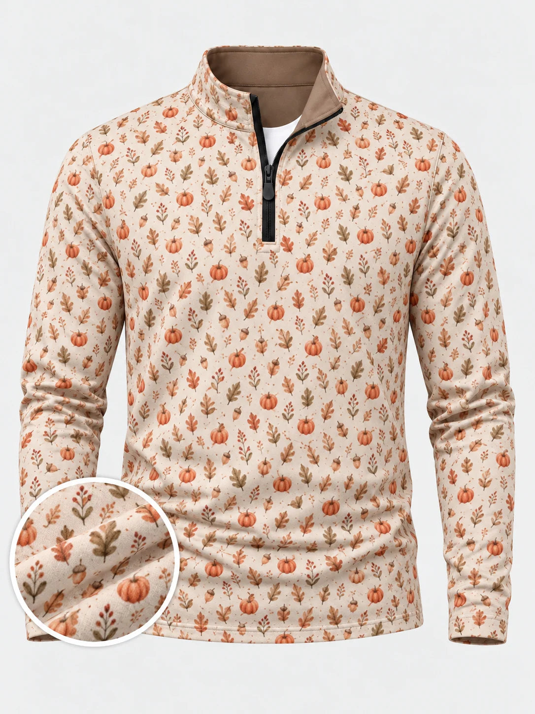 Cremefarbener Golfpullover aus Funktionsmaterial mit Kürbismuster und kurzem Reißverschluss